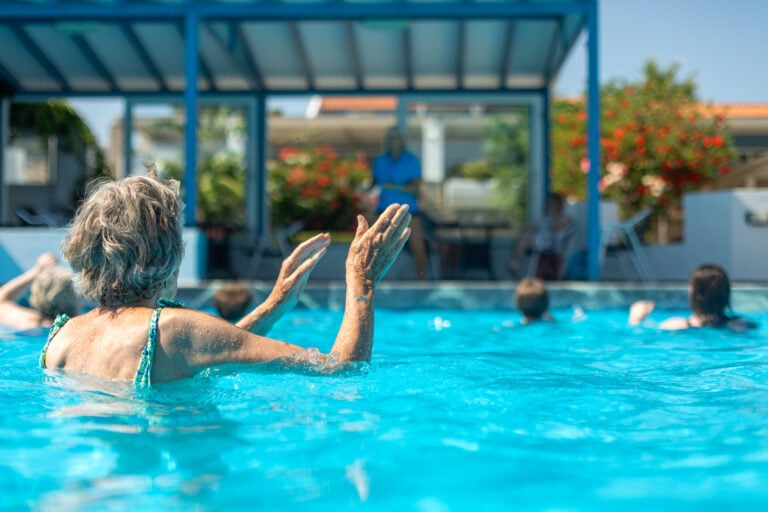 Richmond Holidays solo travelling guest joining in with the fun in the swimming pool!