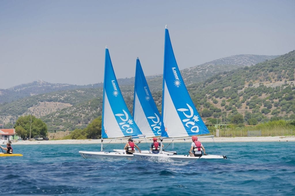 Three Pico sailing boats racing around the bay whilst on holiday in Samos