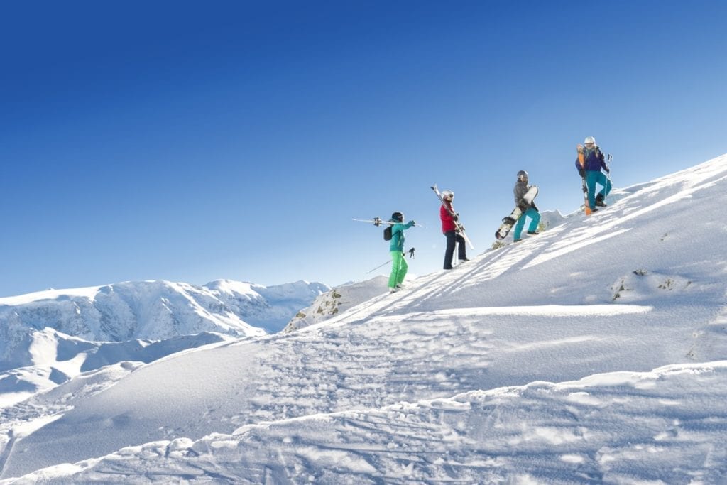 Friends exploring the mountains on a Christian Ski holiday