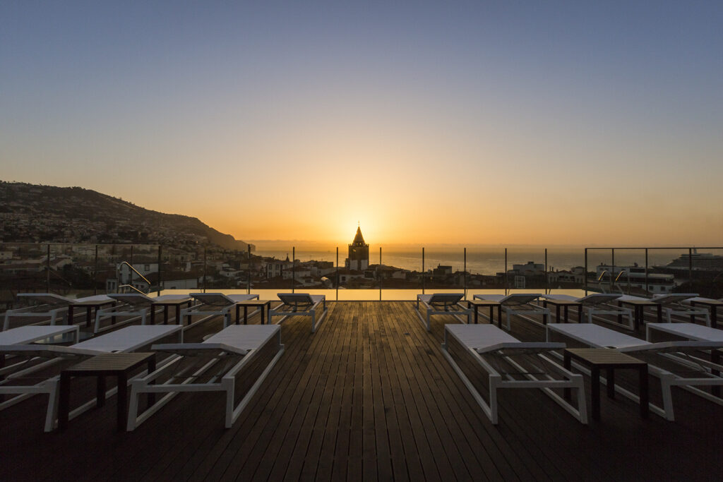 A beautiful view overlooking the historic town of Funchal from the roof of the Castanheiro Boutique Hotel
