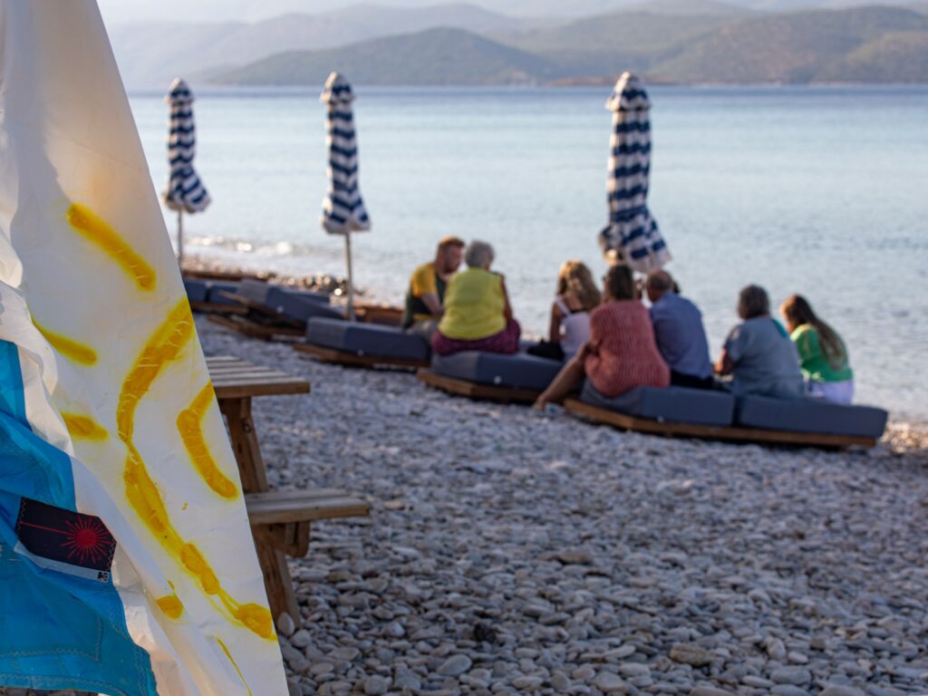 Group of guests a attending ministry session on the beach