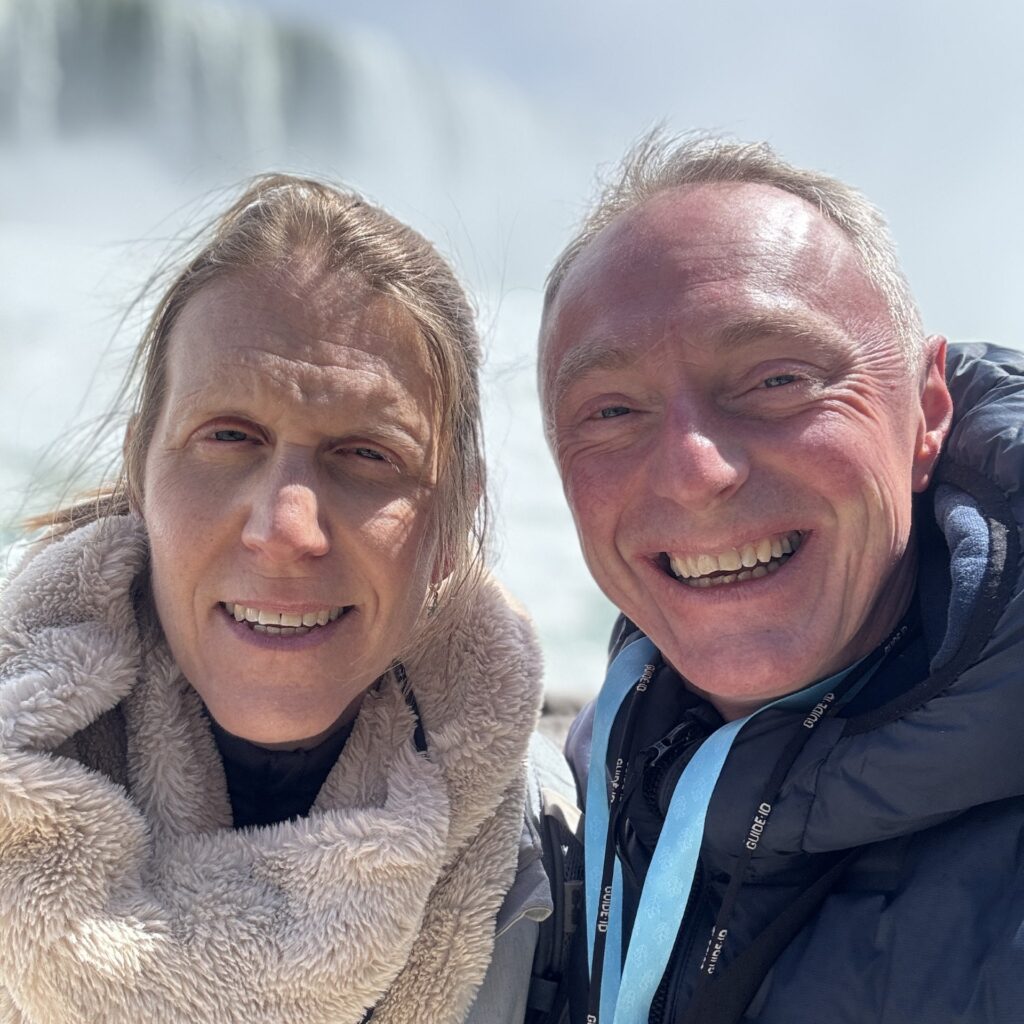 Paul and Fiona smiling in ski jackets