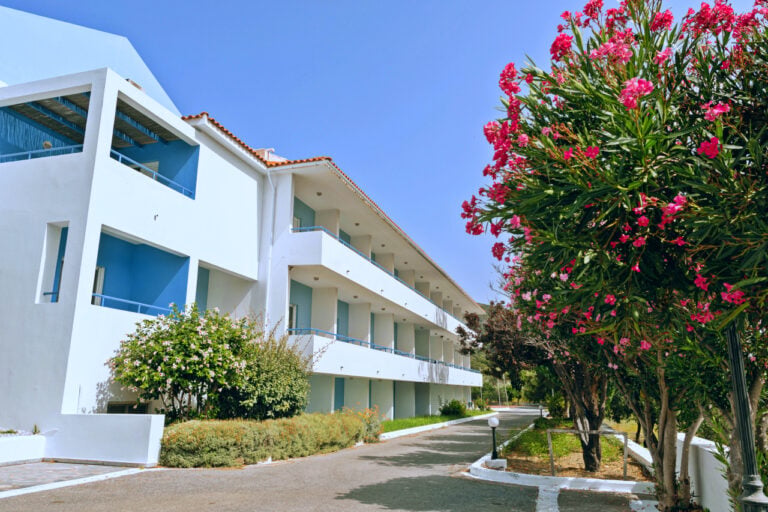 Side view of the back of the hotel showing the balconies of the rooms