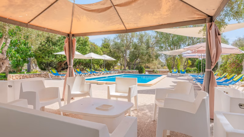 outside communal seating next to pool
