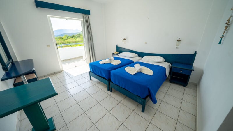 A Reception Level Room with two twin beds and a balcony with sea views.