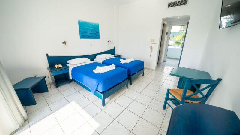 A Reception Level Room with two twin beds and a balcony with sea views.