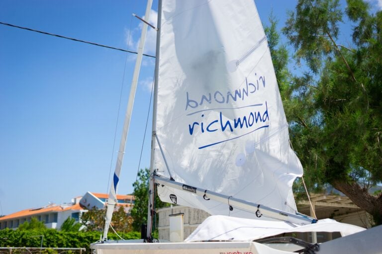 Richmond Holidays boat on the beach