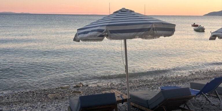 Sun lounger on the beach outside the hotel