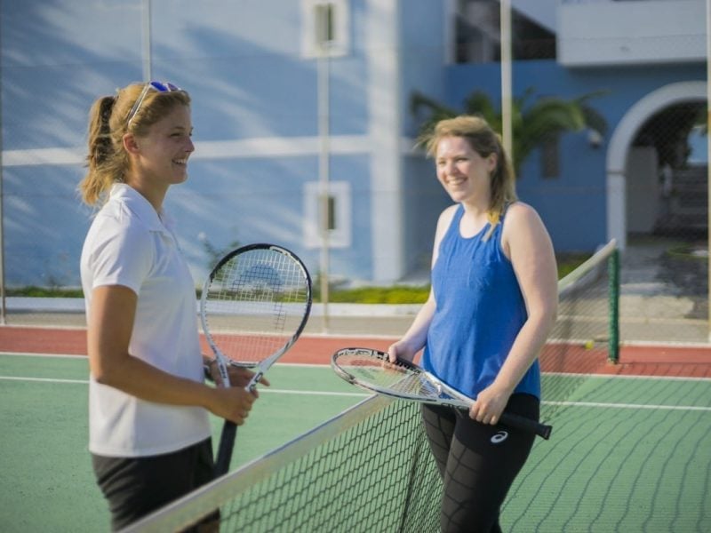 A tennis match on the courts at the Zefiros Beach Hotel in Samos, Greece