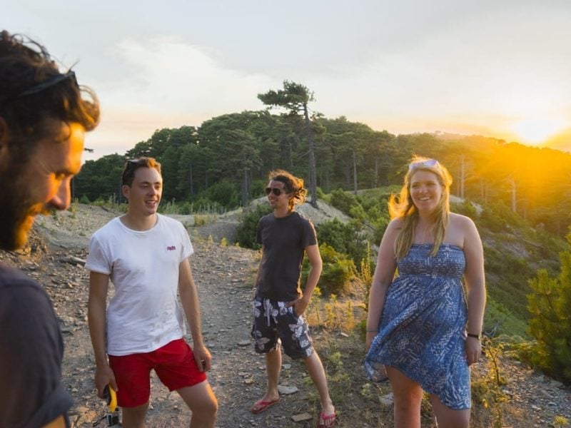 Friends exploring Samos, Greece as the sun sets