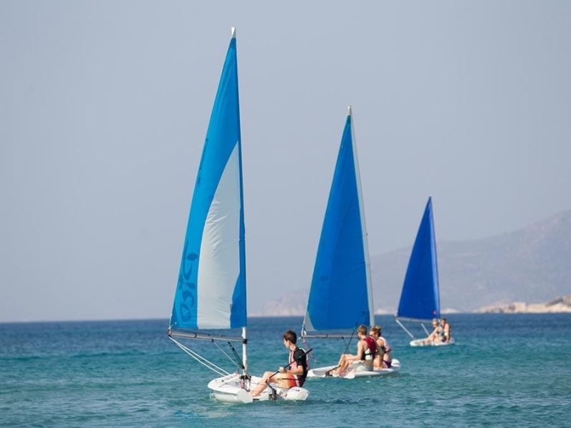 Guests enjoying Richmond's sailing boats in Mykali Bay, Samos